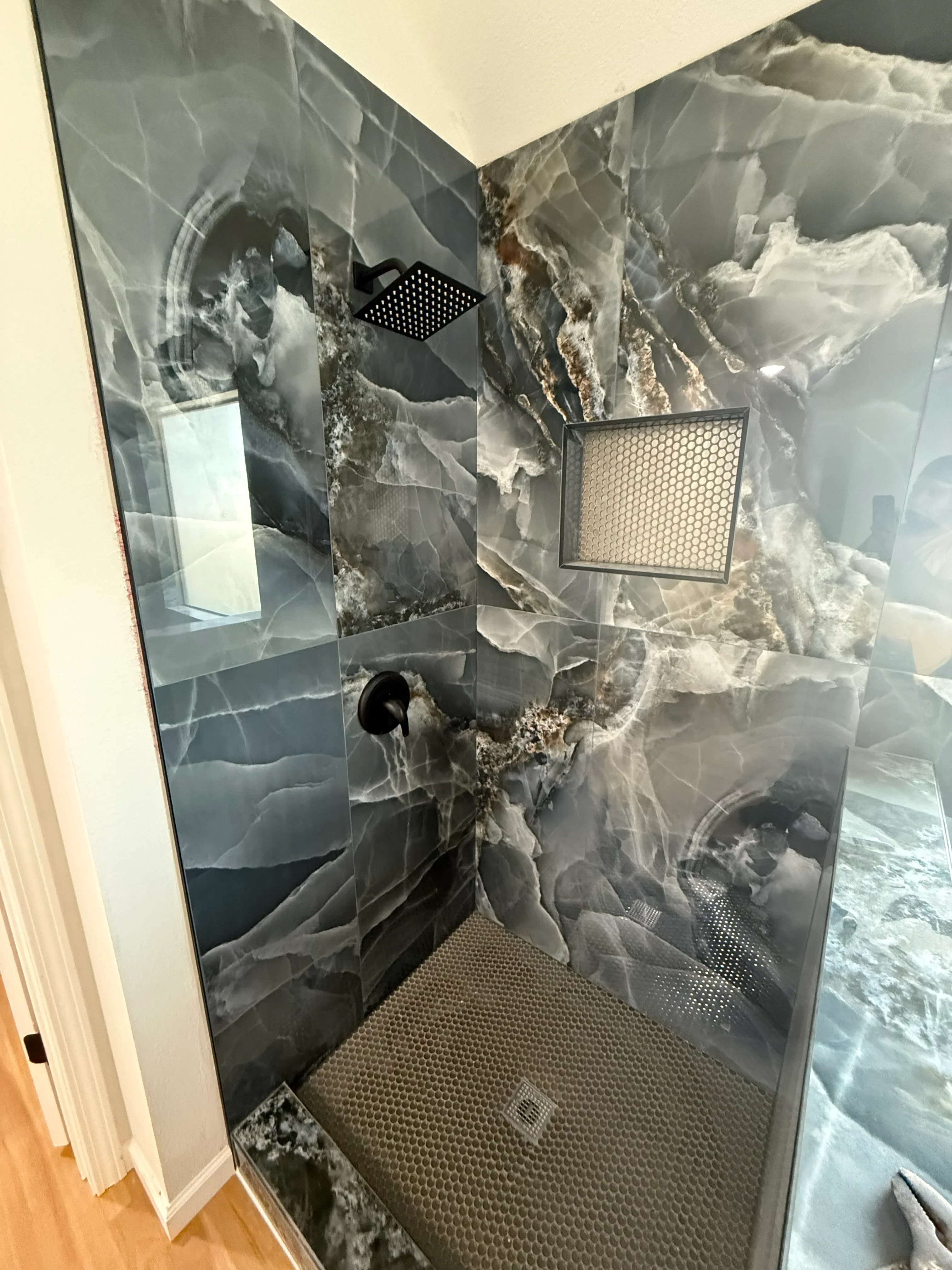 Water-damaged HVAC system with saturated insulation, corroded metal ducts, and mold growth